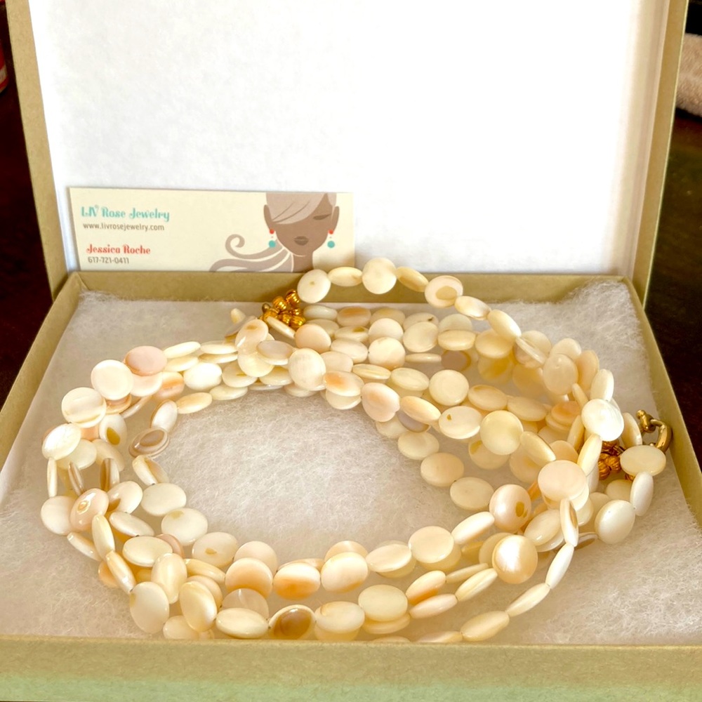 NIB beautiful ivory four strand necklace